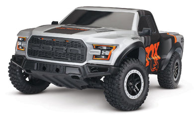 Traxxas Ford Raptor 1/10 2WD Replica Truck RTR with TQ 2.4GHz Radio System and XL-5 ESC (Fwd/Rev) Includes 7-Cell NiMH 3000mAh Traxxas Battery and 4-amp USB-C Charger w/ iD - Fox
